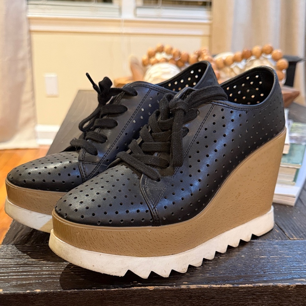 Steve Madden Black and Tan Perforated Wedge Sneakers